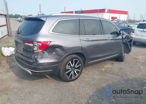 2019 Honda Pilot Touring z USA, uszkodzony, nr VIN 5FNYF5H93KB028641